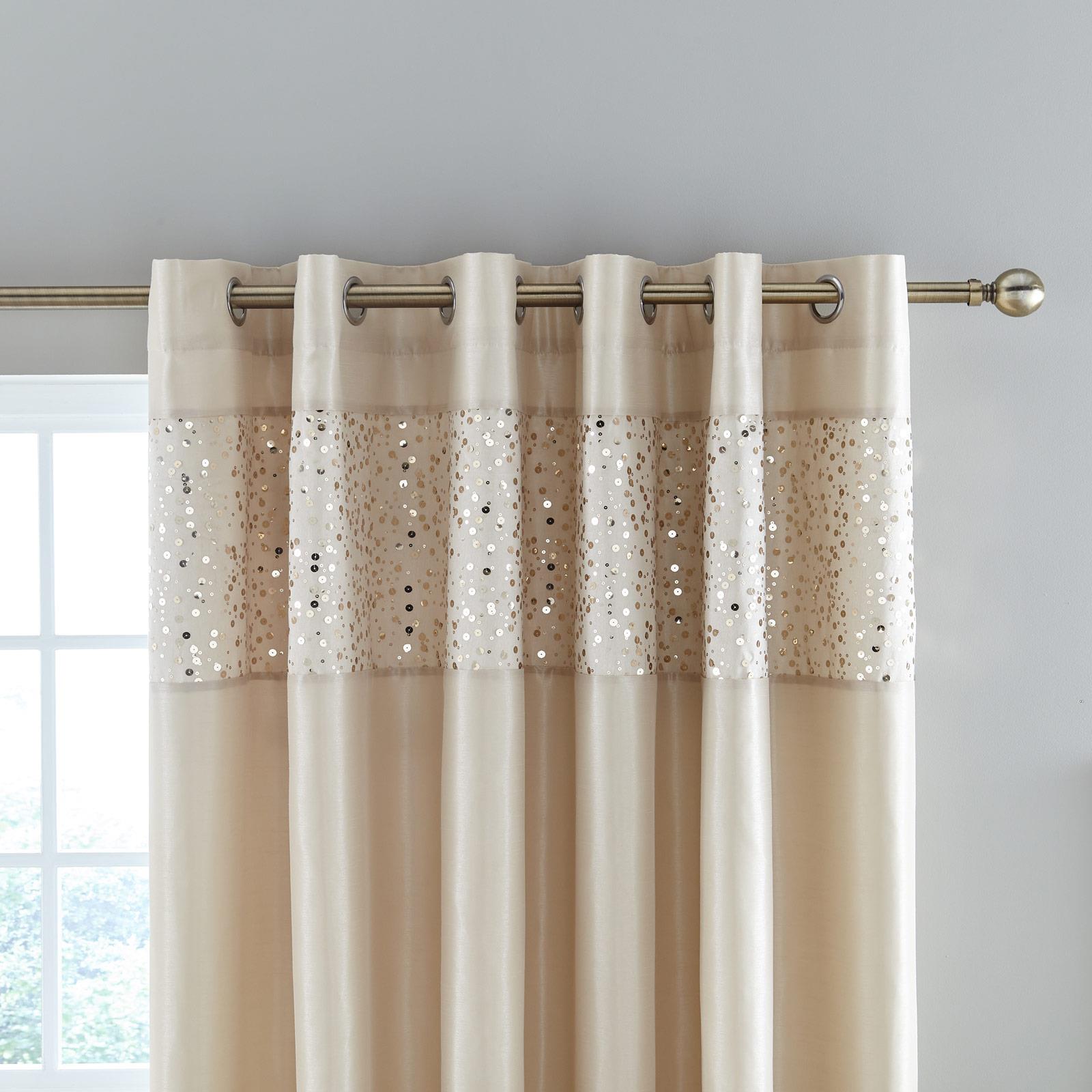 Glitzy Eyelet Curtains by Catherine Lansfield
