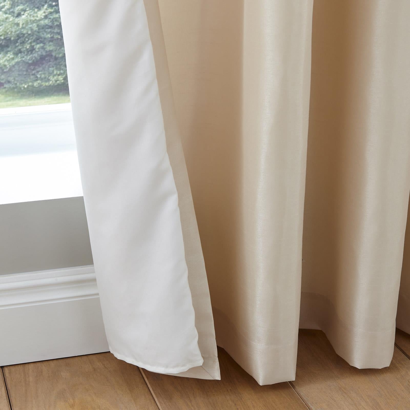 Glitzy Eyelet Curtains by Catherine Lansfield